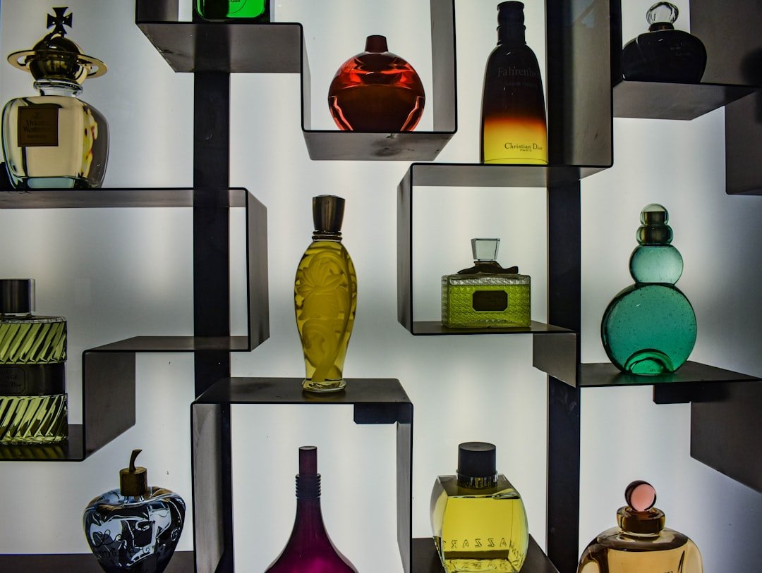Antique perfume bottles displayed in a museum collection