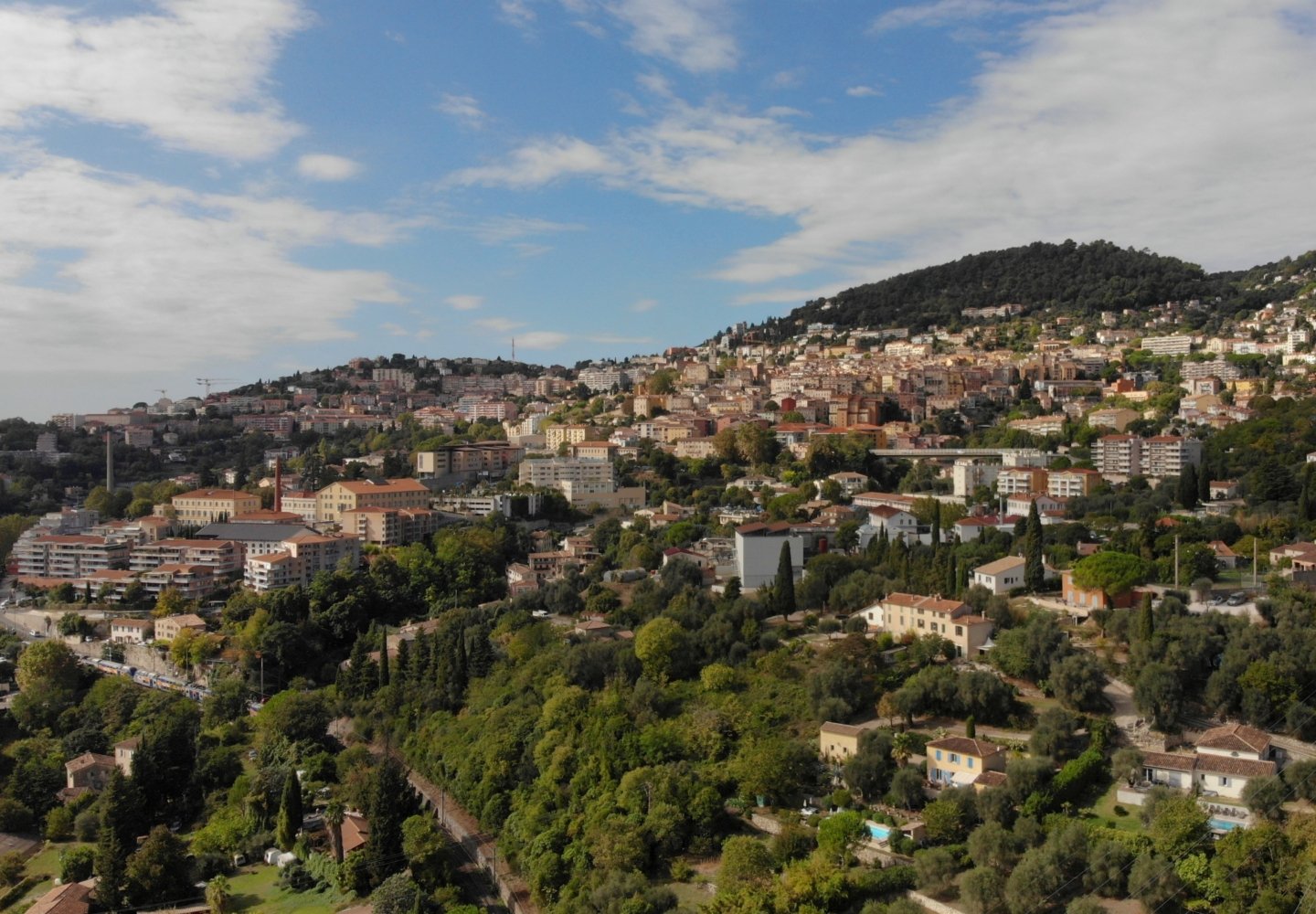 Panoramic view of Grasse, France, historic centre and surrounding hills